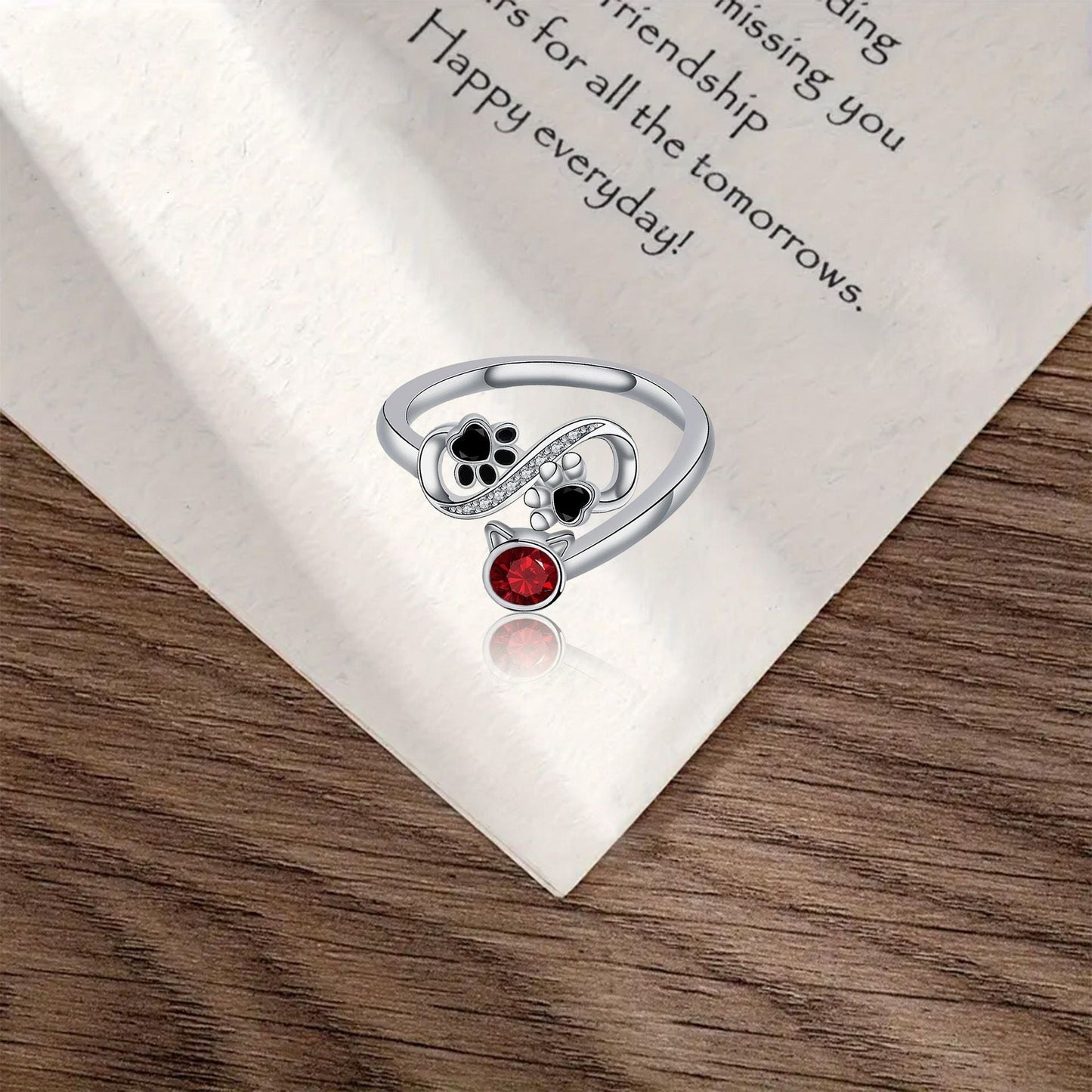 Black Paw Print Adjustable Ring With Red Gemstone™